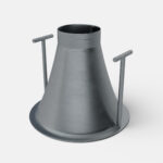 Metal pouring funnel positioned over a crucible for clean gold transfer