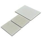 Metal plate with evenly spaced holes used in fire assay sample preparation