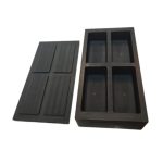 four cavity graphite ingot mould for casting gold and silver bullion bars in gold refining industry.